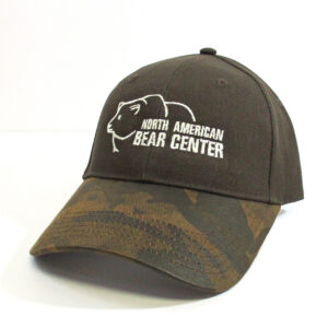 Green camo hat with bear outline with white North American Bear Center lettering.