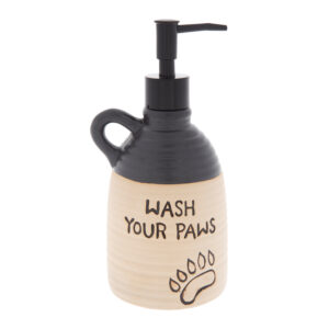 Hand soap dispenser with was your paws etched in.