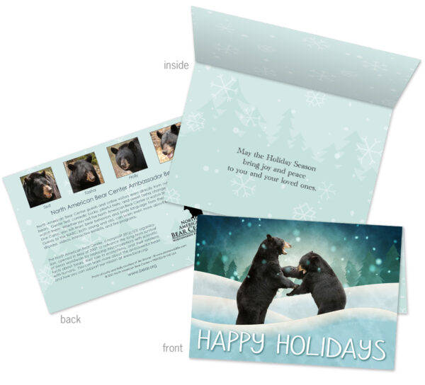 Two bears are playing in the snow on the front of this Christmas card.