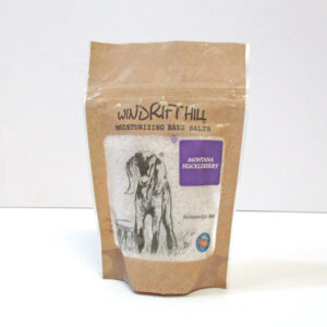 Bath salts with huckleberry and goat milk in a pouch.