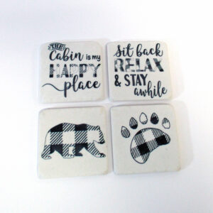 Ceramic coasters four pack with white and black plaid.